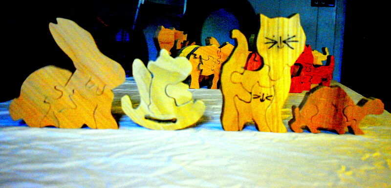 Santa’s woodworking helpers are busy making puzzles for needy children